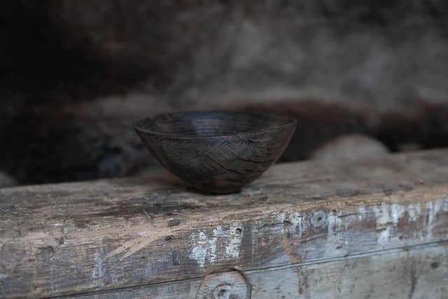 A vintage 1990 Mike Chai Scott Turned Burr Elm Wood Bowl