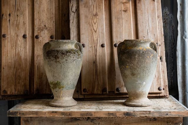 A Pair of Elegant French Tall Urns