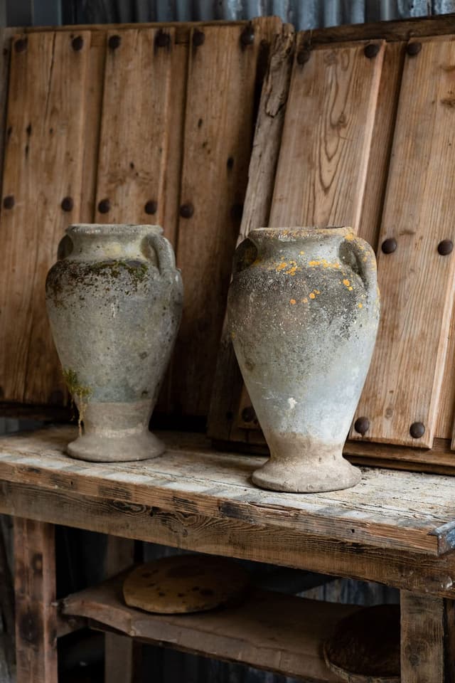 A Pair of Elegant French Tall Urns