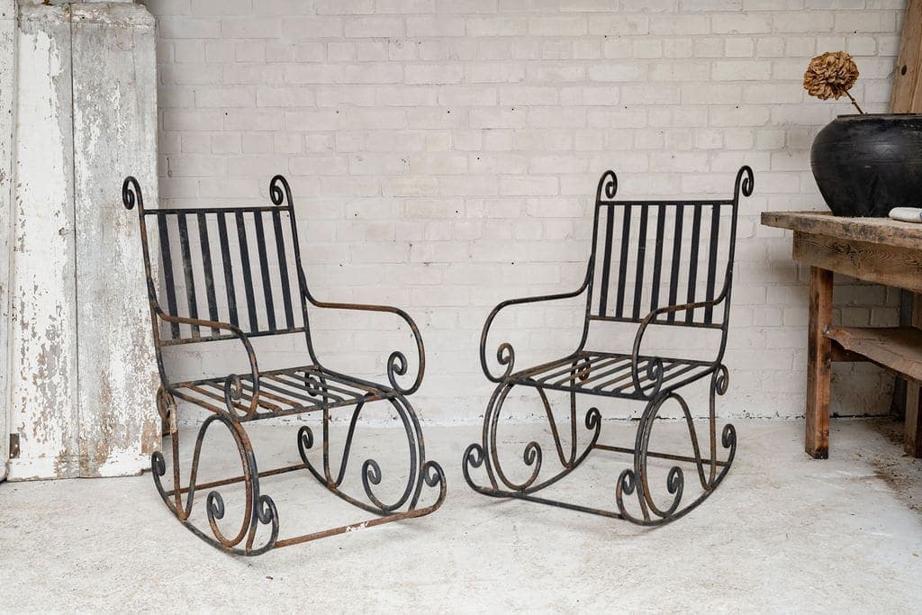 A Pair of Elegant Antique Rocking Chairs in Wrought Iron